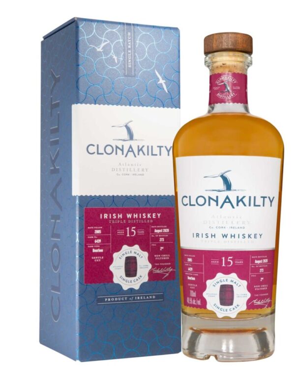 A photograph of a bottle of whiskey and it's carton taken on product photography shoot