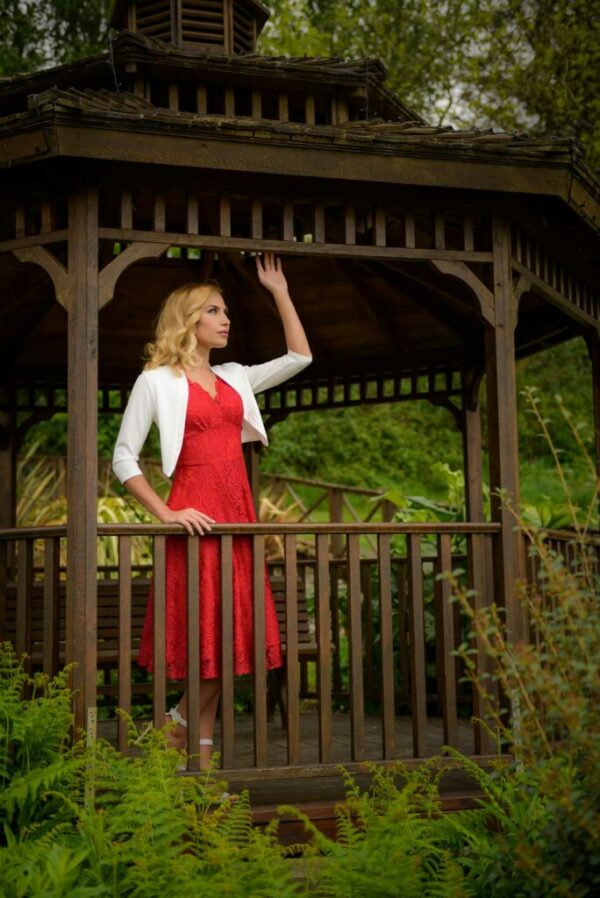 A Model posing on a fashion photography photo shoot in a hotel garden