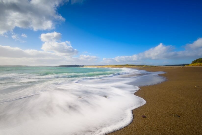 Long Strand Beach west Cork at high tide.