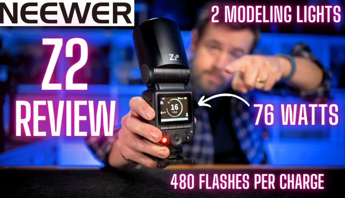 Man pointing at the Neewer Z2 Flash for my Neewer Z2 Review video