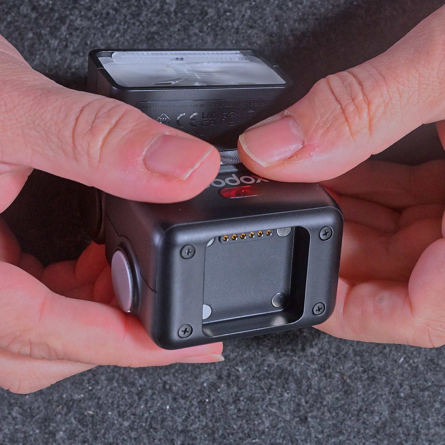 The hot shoe recess on the Godox IT32 before the X5 trigger was inserted.