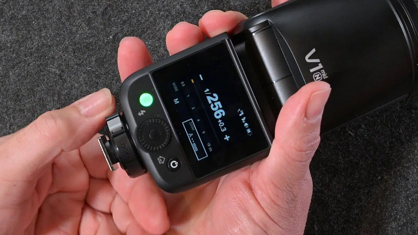 The Godox V1 Mid Hot Shoe and the twist lo9ck system used to secure it onto the camera.