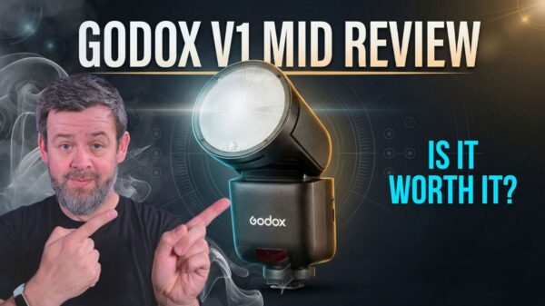 My Godox V1 Mid review hero image with a man pointing to the V1 Mid flash